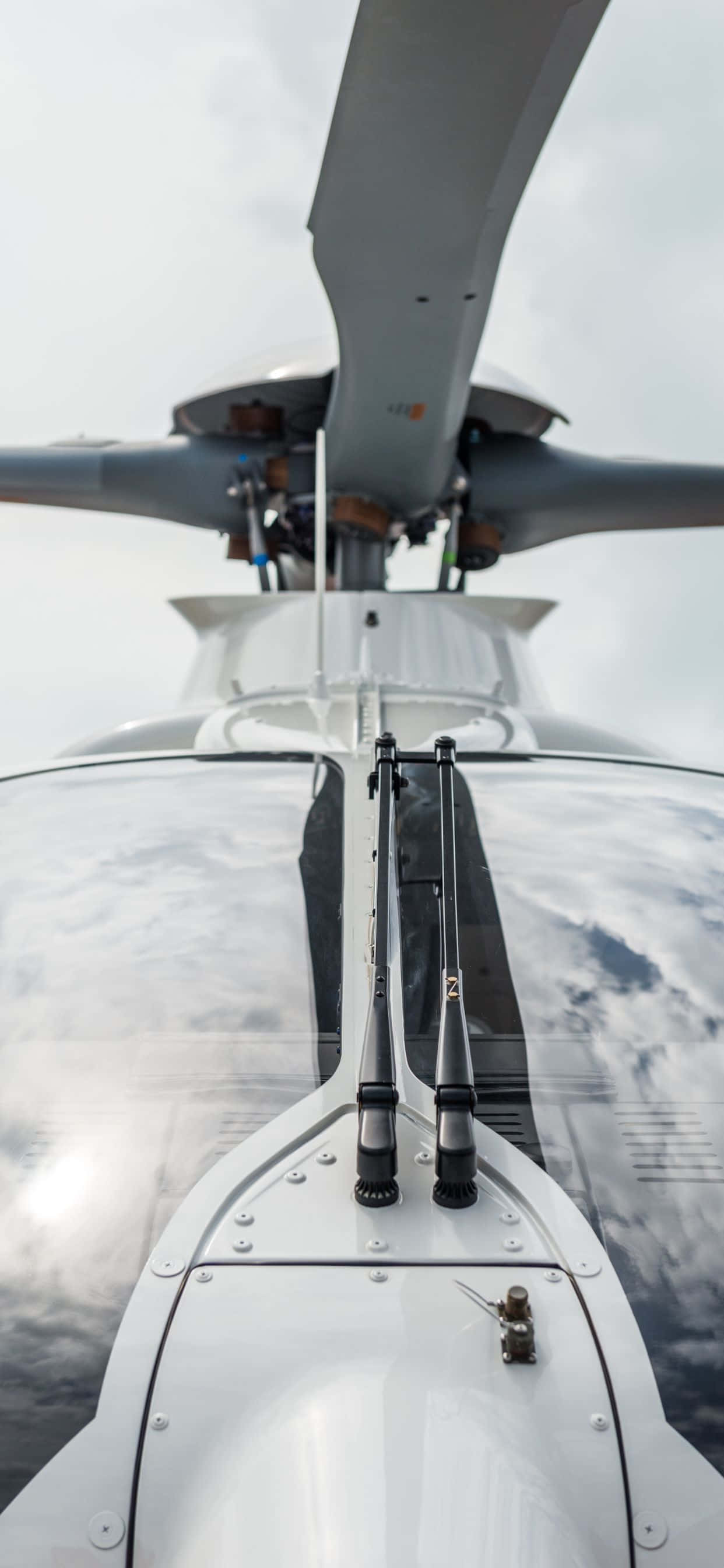 Nyt et unikt perspektiv av himmelen med iPhone Xs Max Helikoptre Bakgrunner