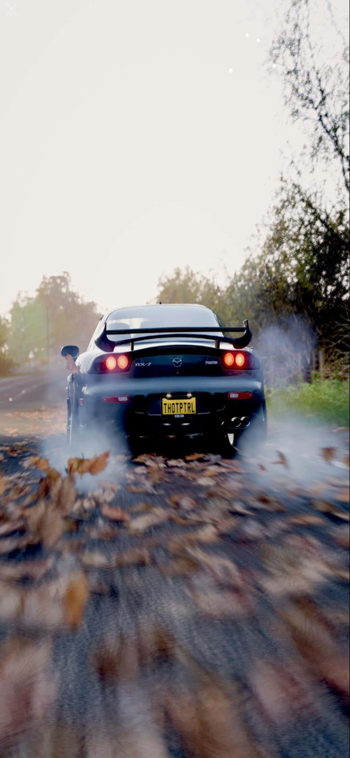 Nyt grafikk av høy kvalitet og en oppslukende opplevelse med iPhone Xs og Forza Horizon 4 Bakgrunner