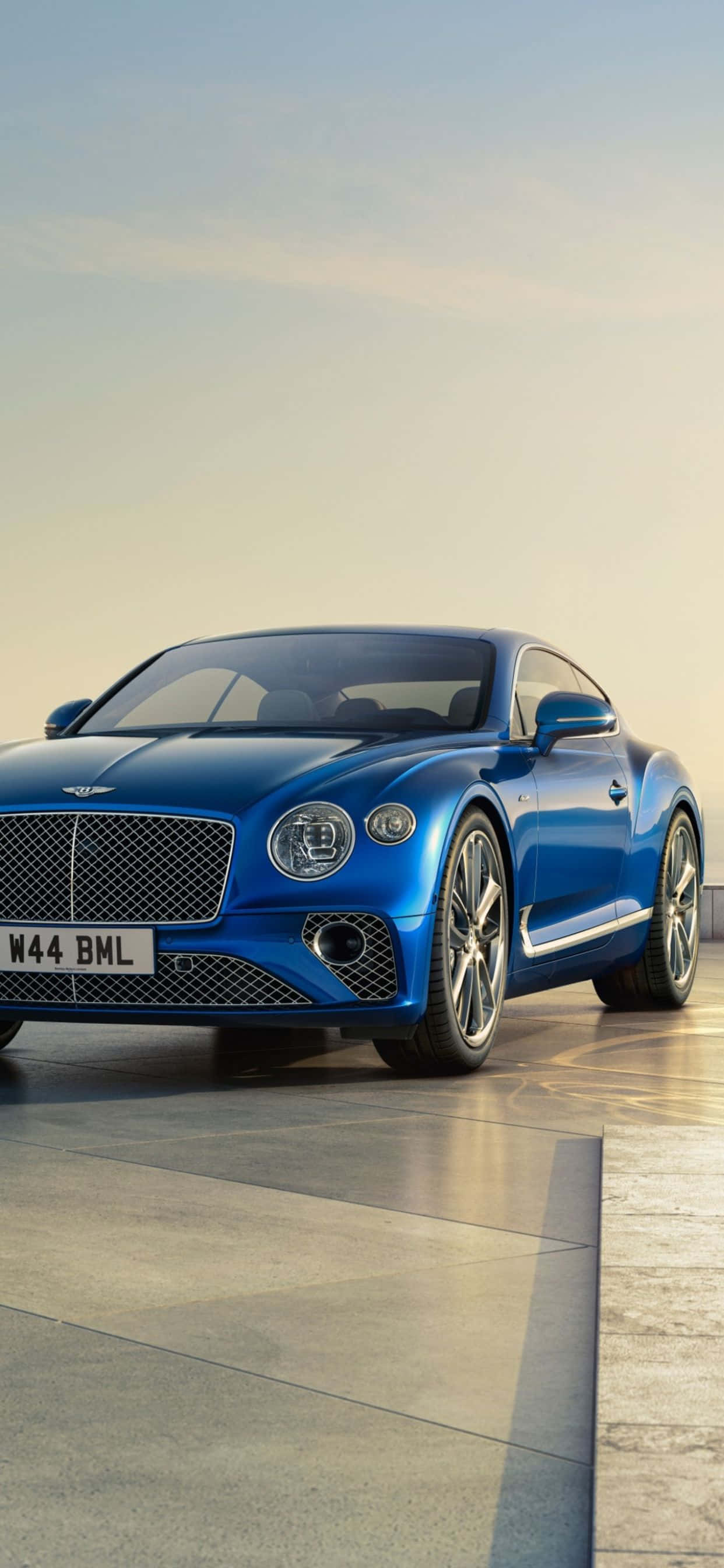 Nyt luksusen av iPhone Xs Max og en Bentley Bakgrunner