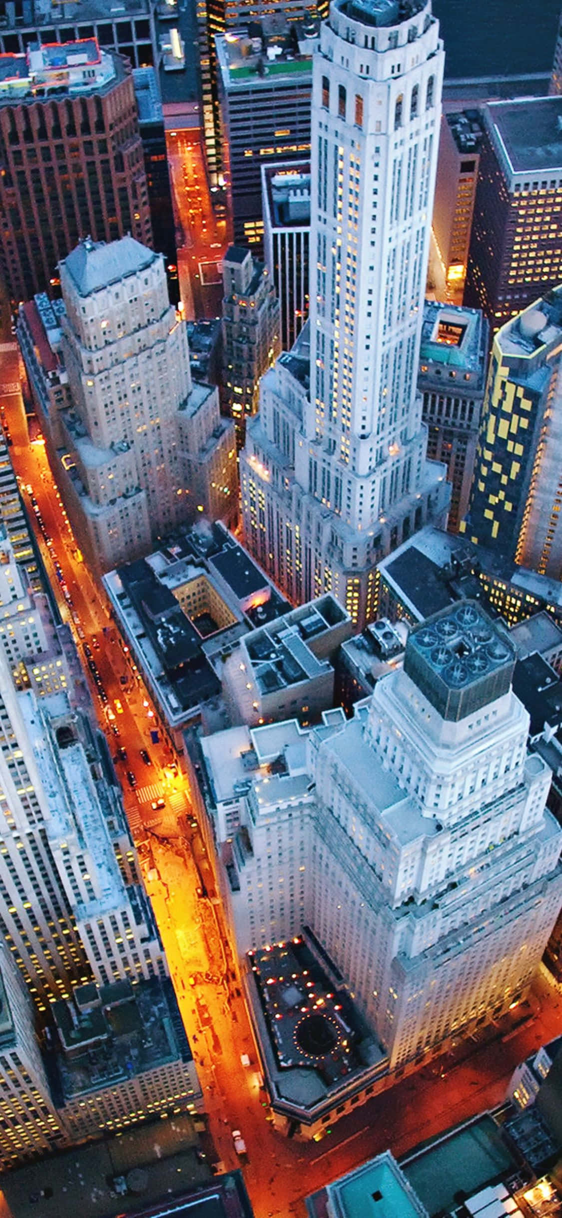 Nyt skjønnheten av en solnedgang i New York City med iPhone Xs. Bakgrunner