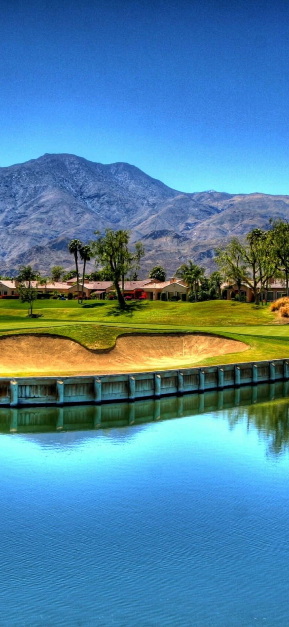 Nyt skjønnheten til en golfbane med din iPhone X. Bakgrunner