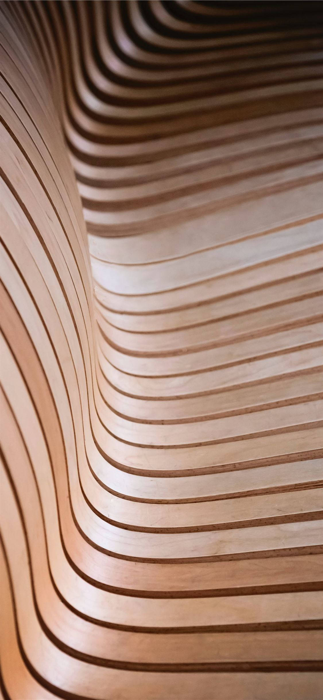 Nyt sømløs og moderne designstil med en beige iPhone Bakgrunner