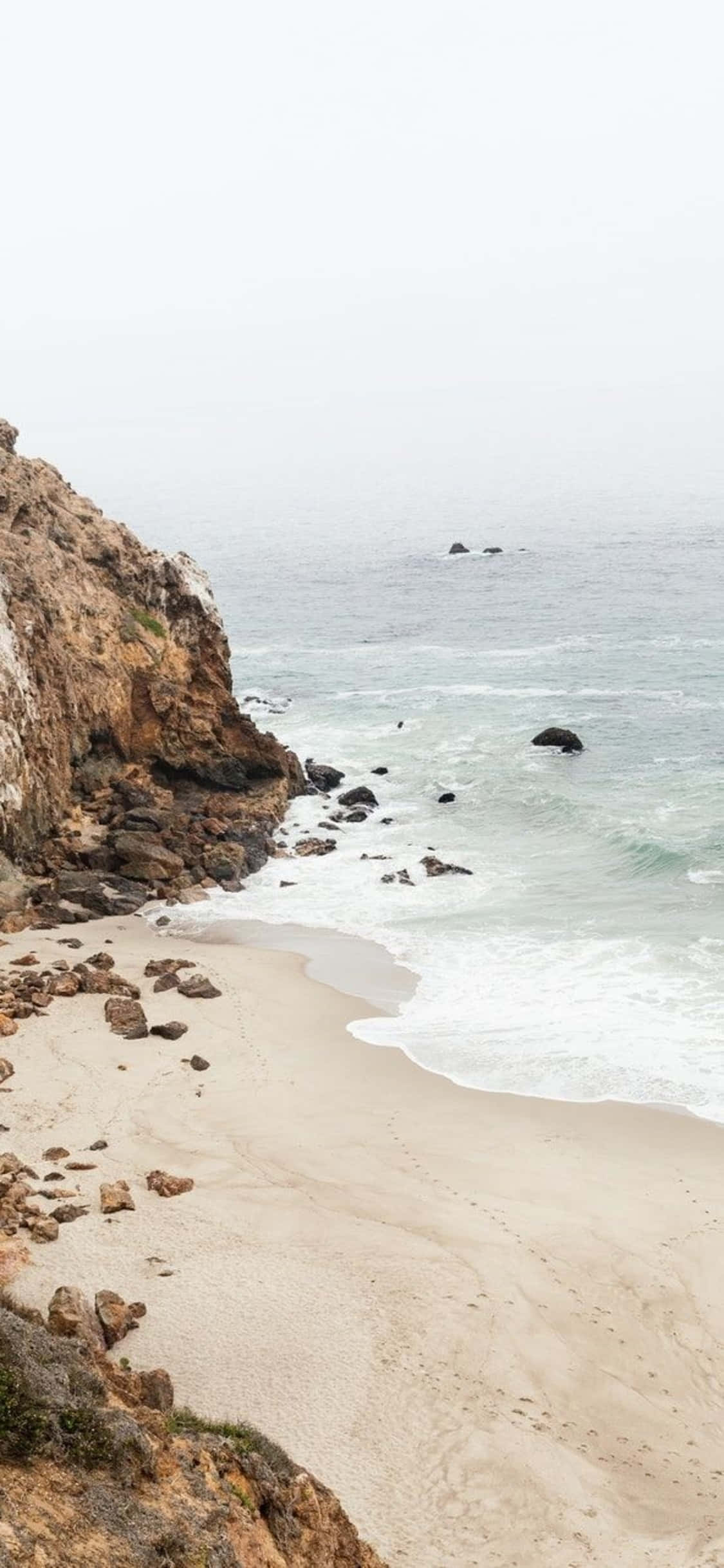 Nyt utsikten fra Malibu med den nyeste iPhone Xs Bakgrunner