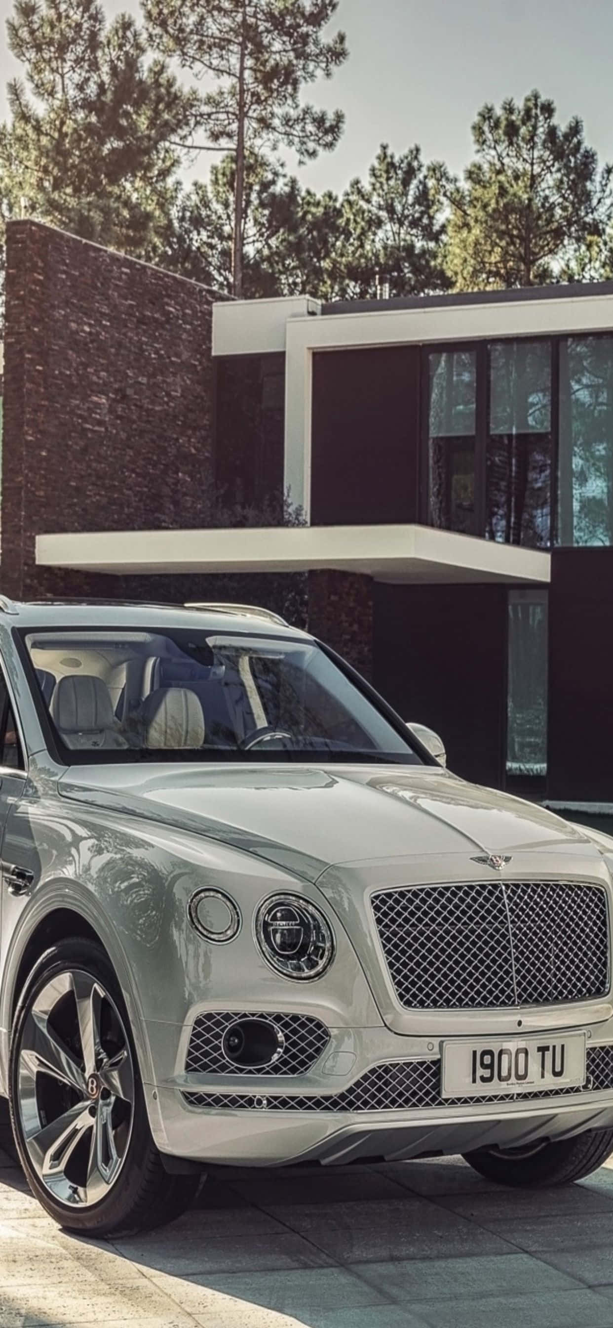 Opplev en luksuriøs livsstil med iPhone Xs Max og Bentley Bakgrunner