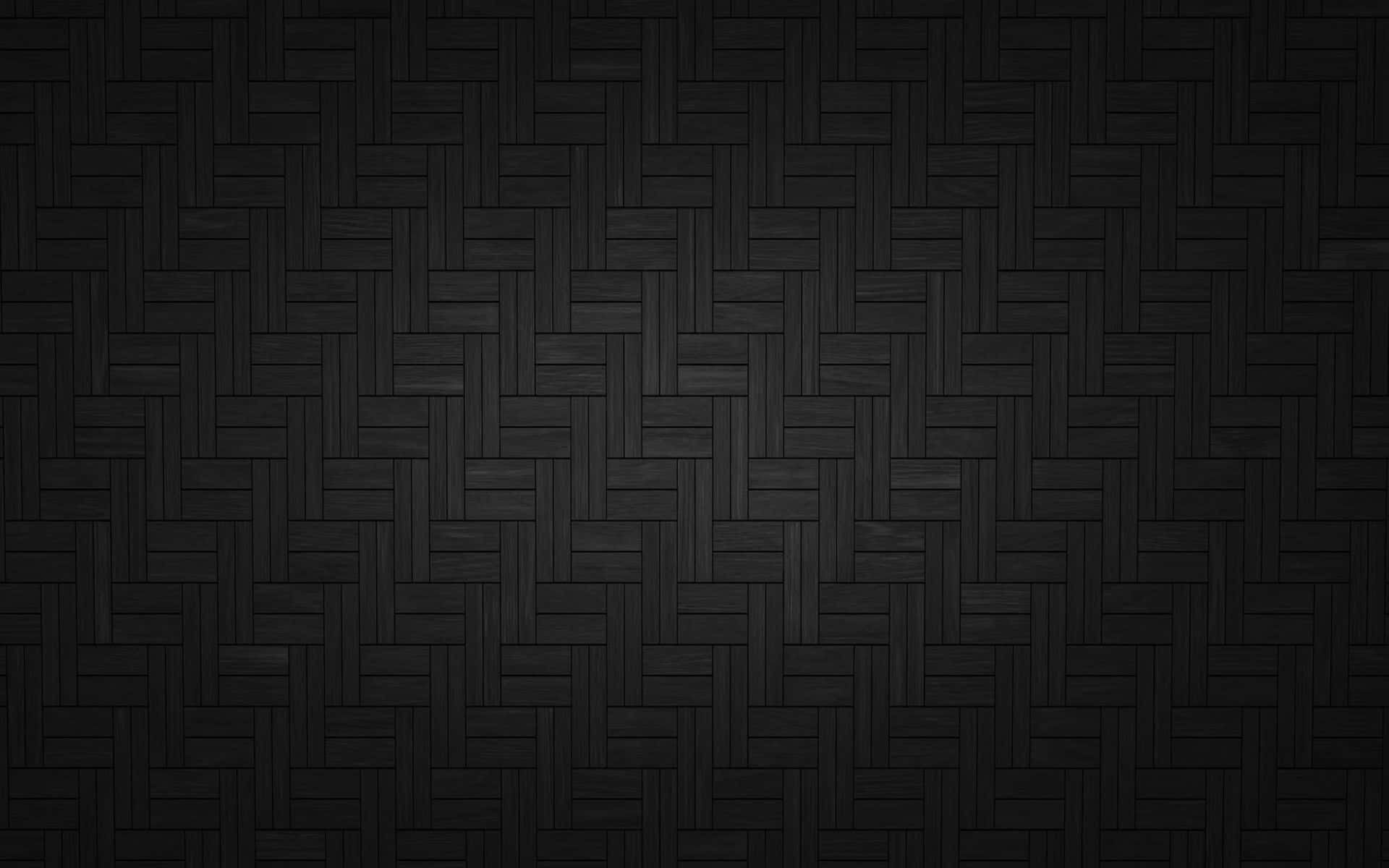 Opplev et kult og moderne utseende i rommet ditt med denne minimalistiske svarte bakgrunnen. Bakgrunner