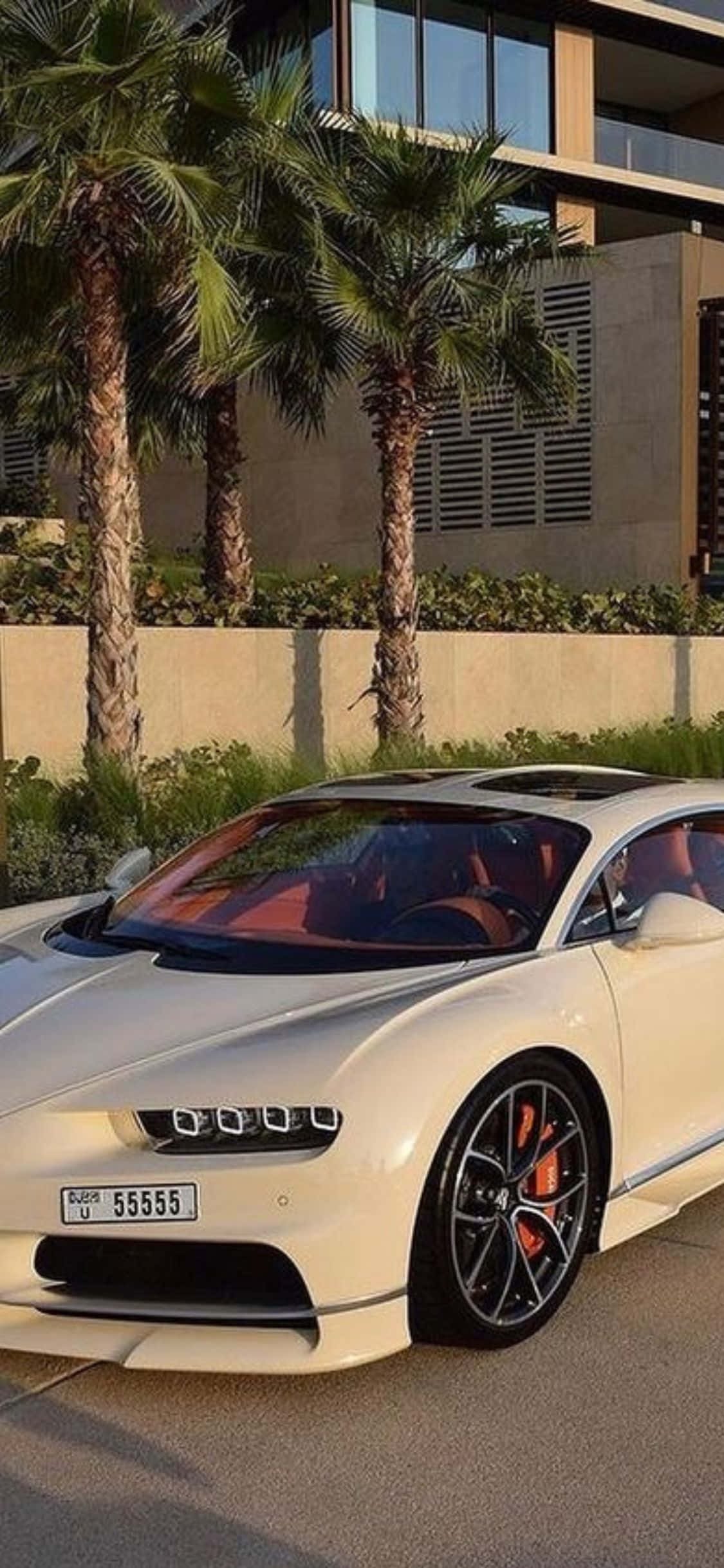 Optimal luksus: En iPhone XS og en Bugatti Veyron, den perfekte kombinasjonen for den luksuriøse livsstilen Bakgrunner