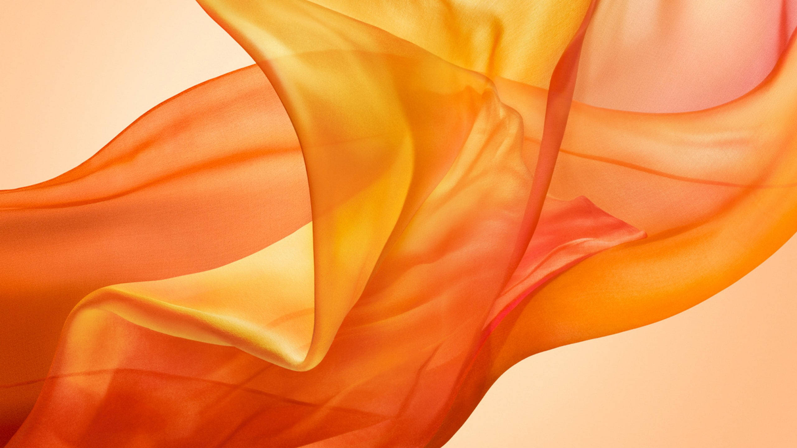 Oransje MacBook Air Bakgrunner