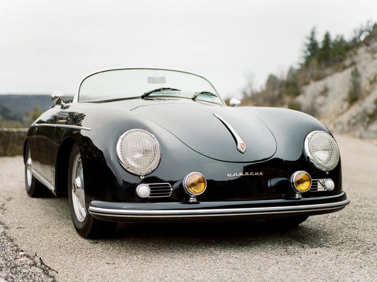 porsche 356 speedster - en klassisk svart sportsbil Bakgrunner