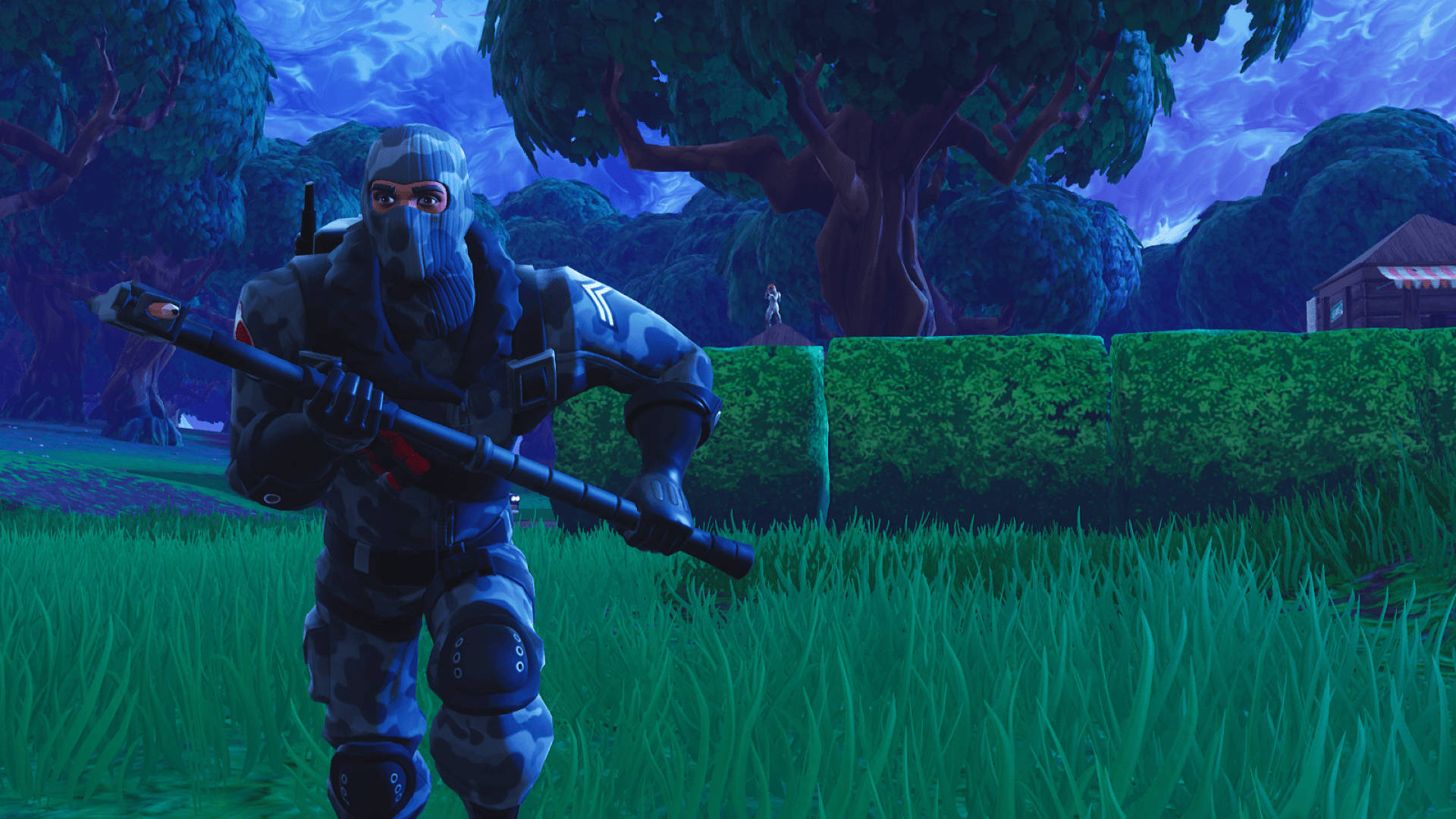 Havoc løper om natten med en hakke i spillet Fortnite HD-bakgrunn.