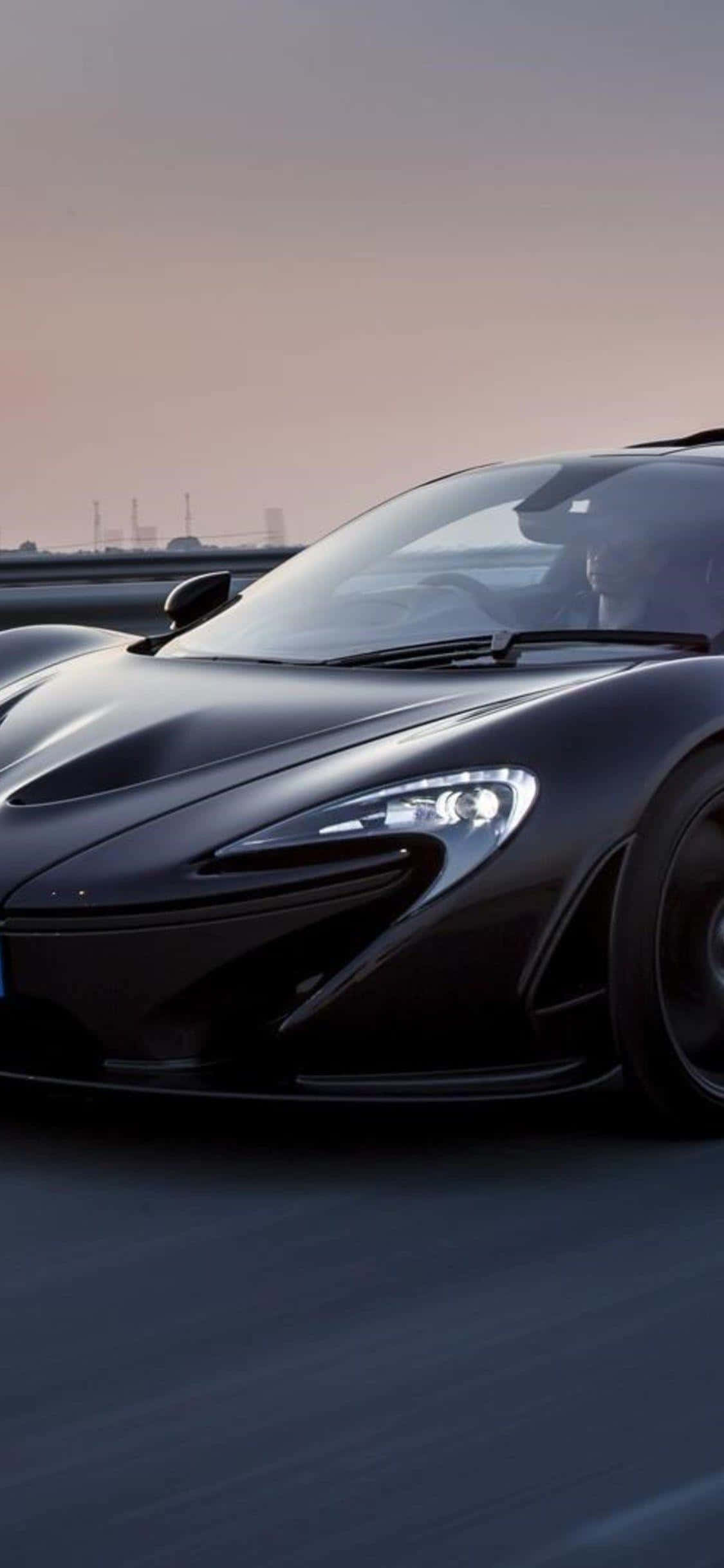 Sett deg bak rattet i den luksuriøse iPhone Xs Mclaren 720s Bakgrunner