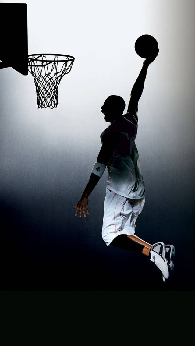 Silhuett av en mann som dunker sports-iPhone Bakgrunner