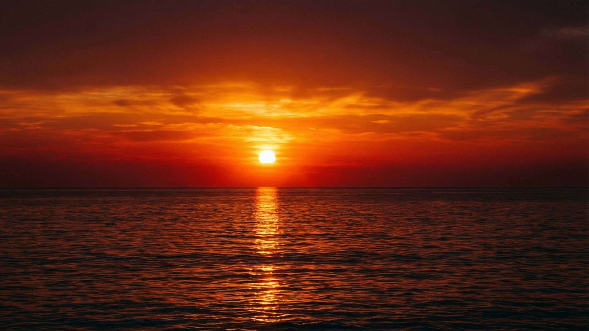 Solnedgang over havets speilbilde Bakgrunner