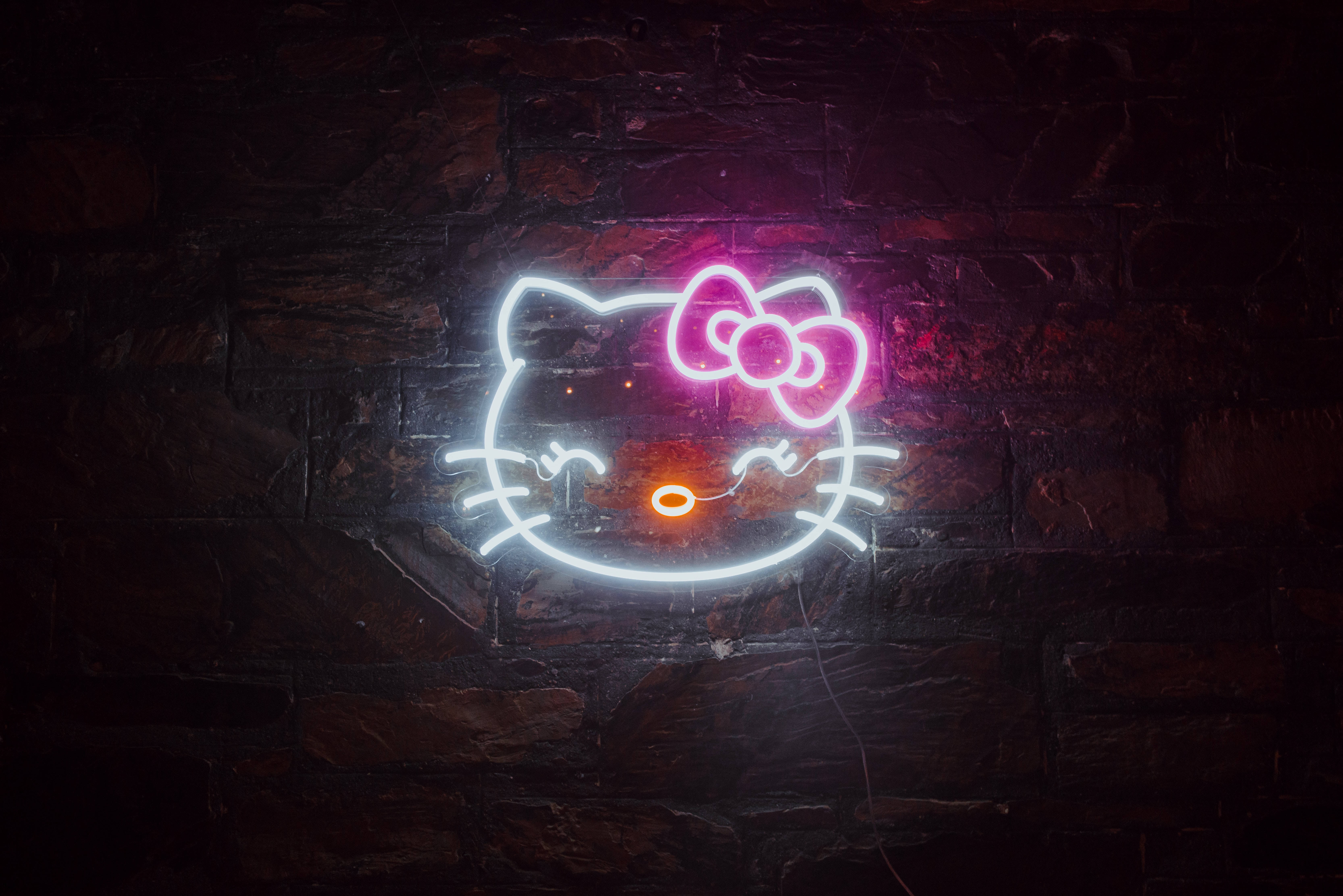 Svart Hello Kitty i neonlys Bakgrunner