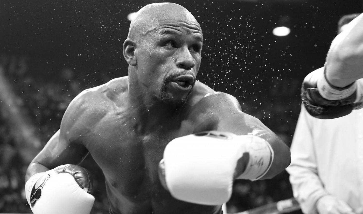Svart-hvitt Floyd Mayweather som slår Bakgrunner