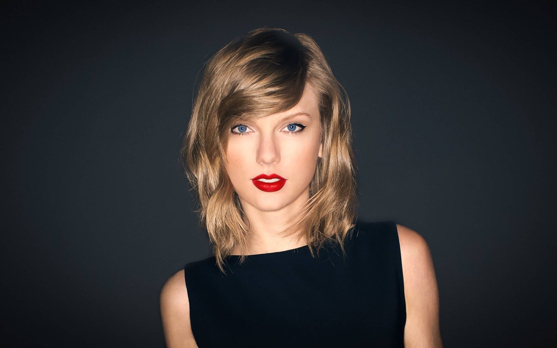 Taylor Swift svart ermeløs topp fotografi bakgrunnsbilde.