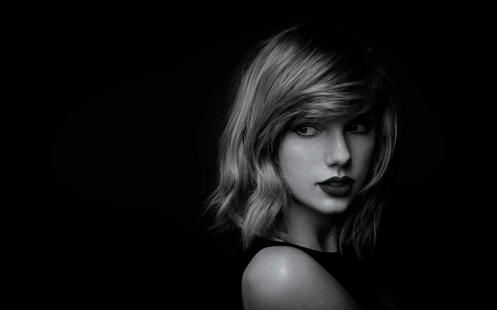 Taylor Swift svart-hvitt portrett, musikk- eller låtskriver.