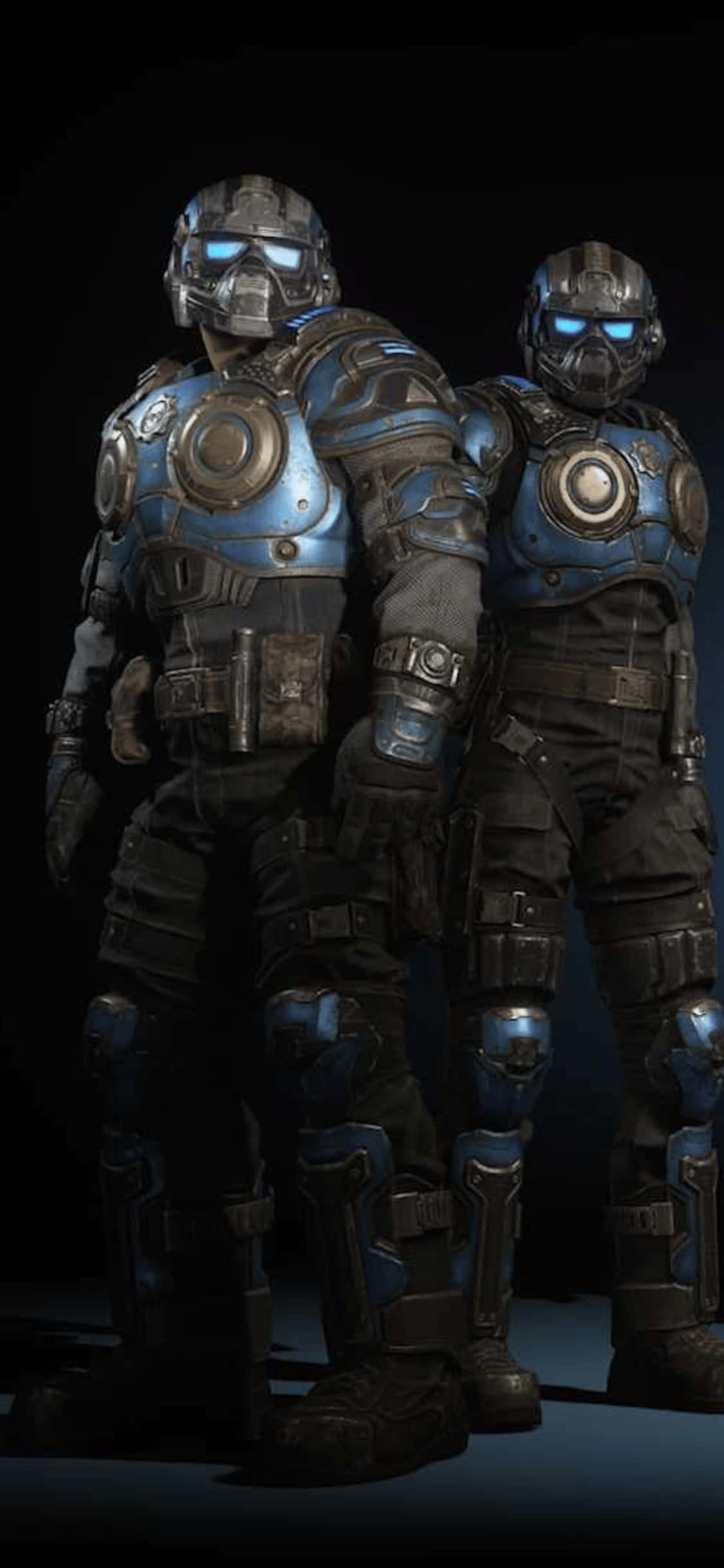 to menn i blå Gears of War-drakter som står ved siden av hverandre Bakgrunner