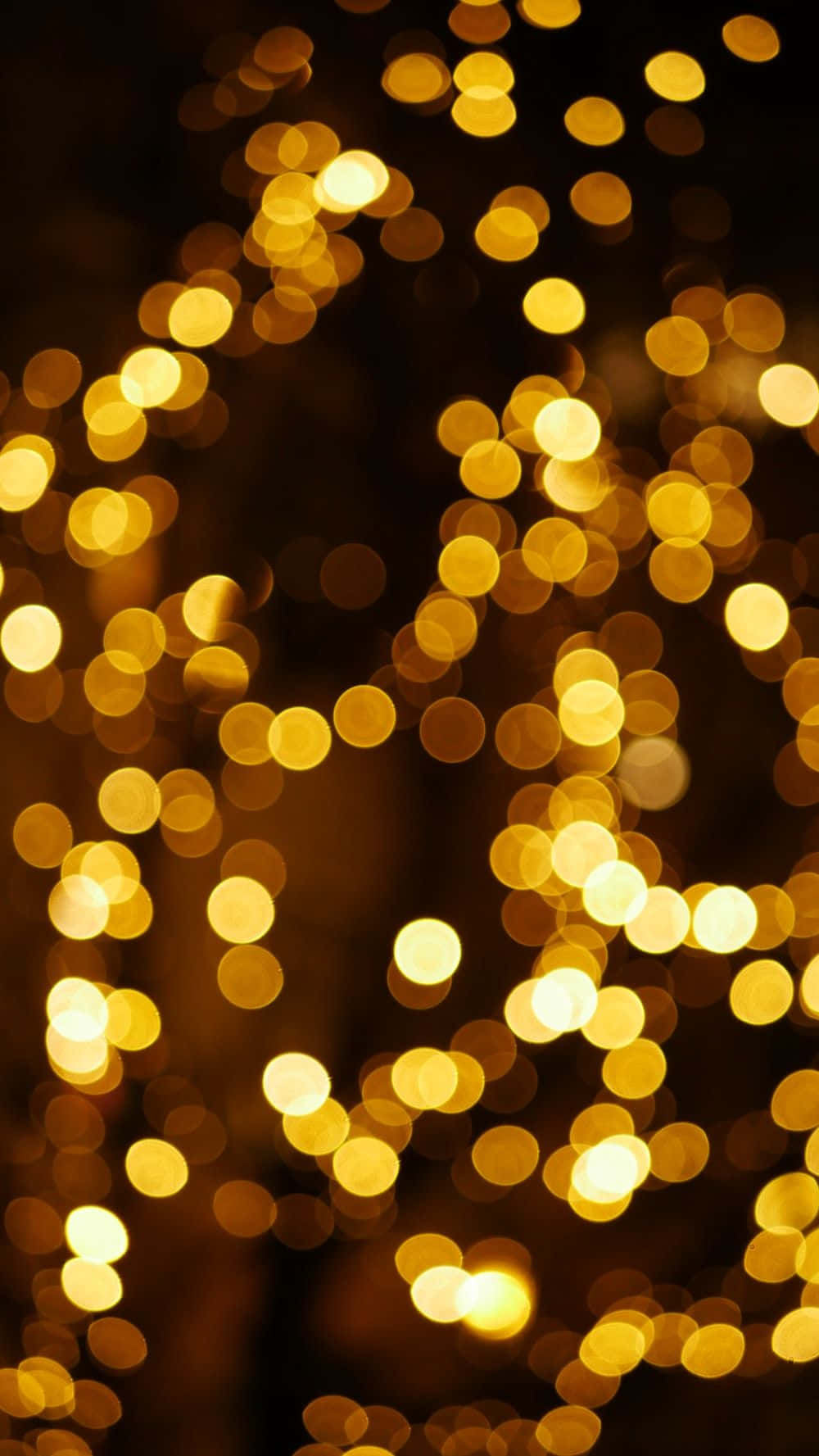 Uskarp gul julestemning med lys Bakgrunner