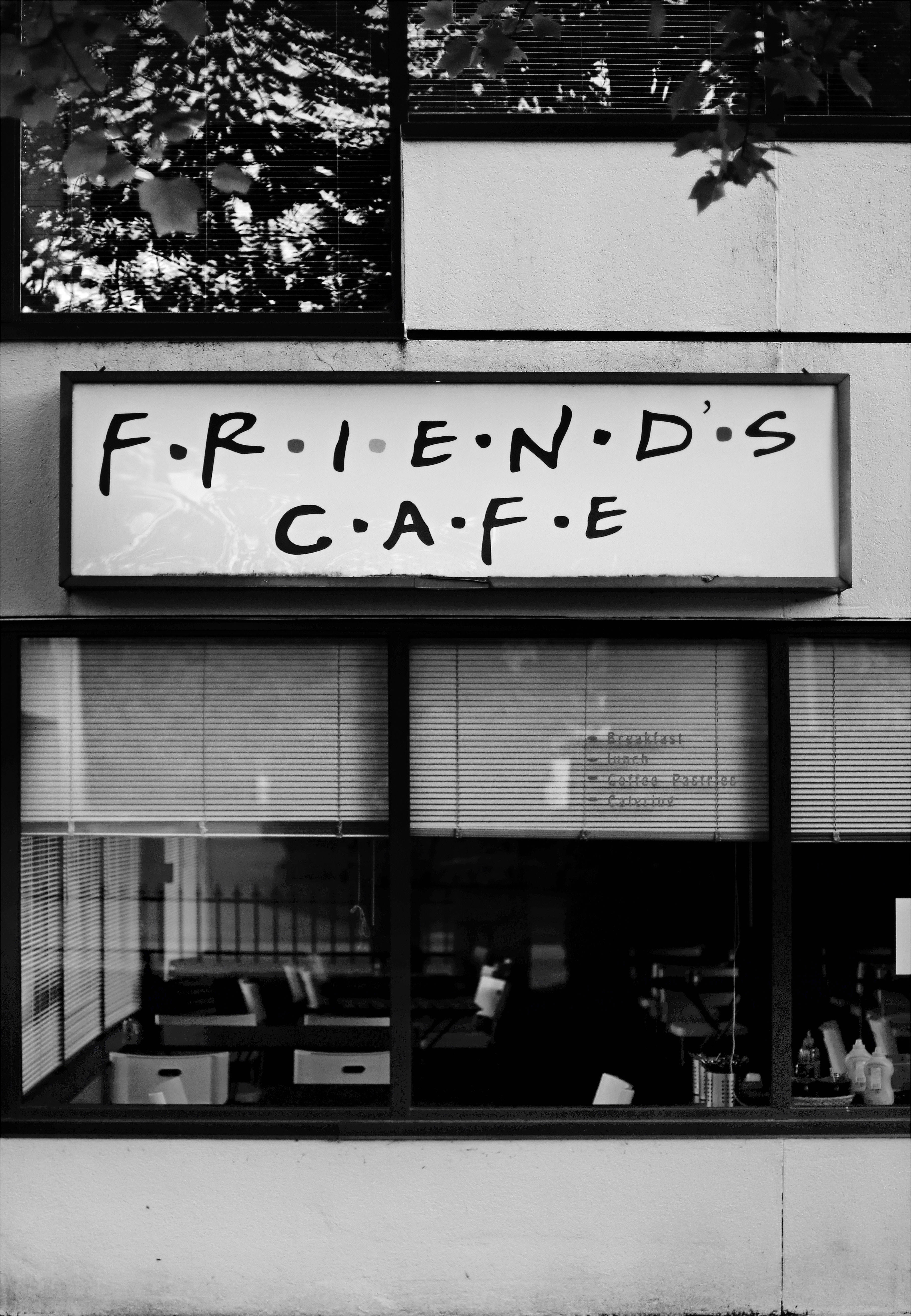 Venner nyter kaffe på Central Perk Cafe Bakgrunner