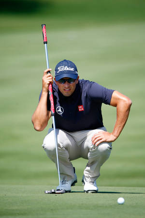 Adam Scott vurderer golfspill — Xiaomi Pad 8 Bakgrunner