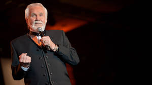 Amerikansk kjent låtskriver Kenny Rogers — Mørkerød Bakgrunner