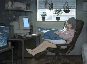 Animejente som sover foran laptop