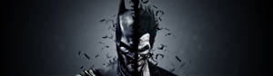Batman og Joker som én på grå dual monitor-bakgrunn