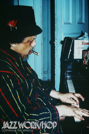 Charles Mingus spiller piano — Huawei MatePad 12 X (2025) Bakgrunner