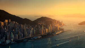 Vakker Hongkong bysilhuett med solnedgang bakgrunnsbilde — 1600x900 Bakgrunner