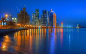 Bakgrunnsbilde av Doha Corniche i Qatar — Skumring Bakgrunner