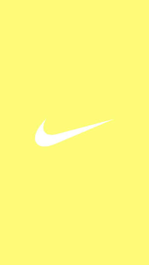Fengslende sprut av søt pastellgul estetikk med ikonisk Nike-logo — Pastellgul estetikk Bakgrunner