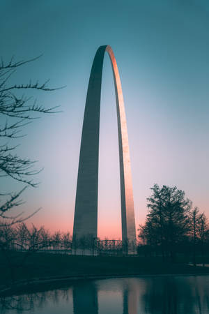 Fengslende utsikt av St. Louis Arch ved solnedgang — Oransje estetikk GIF Bakgrunner