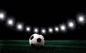 Opplyst fotball HD-bakgrunnsbilde. — True Black Bakgrunner