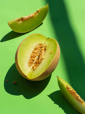 Bakgrunnsbilde med honningmelon og frø — 3:4 Bakgrunner