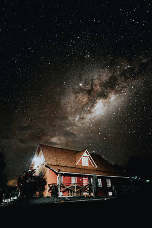 Hus under Stjernehimmel — Xiaomi Pad 8 Pro Bakgrunner