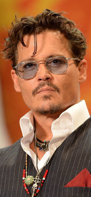 Johnny Depp amerikansk skuespiller bakgrunnsbilde — iPhone 17e Bakgrunner