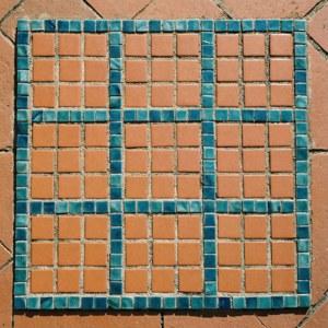 Et keramisk mosaikk sudoku-rist i terrakotta og blågrønt. — Pixel Watch 4 Bakgrunner