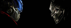 Transformers Optimus Prime vs Megatron dual monitor-bakgrunn — Dobbel skjerm GIF Bakgrunner
