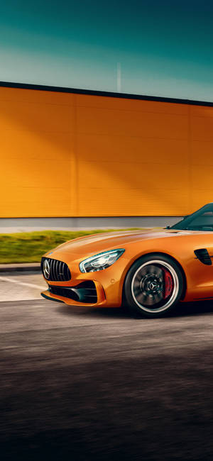 Oransje Mercedes iPhone X — iPhone 15 Plus Bakgrunner