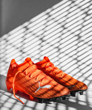 Oransje Puma Ultra 1.1 bakgrunnsbilde — Galaxy Z Fold 6 Bakgrunner