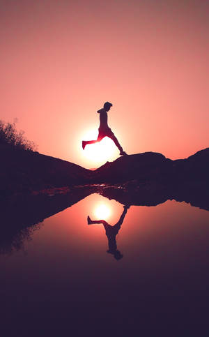 Parkourmann ved solnedgang bakgrunnsbilde — Lenovo Idea Tab Plus Bakgrunner