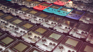 Bakgrunnsbilde med rader av Game Boy Color-modeller