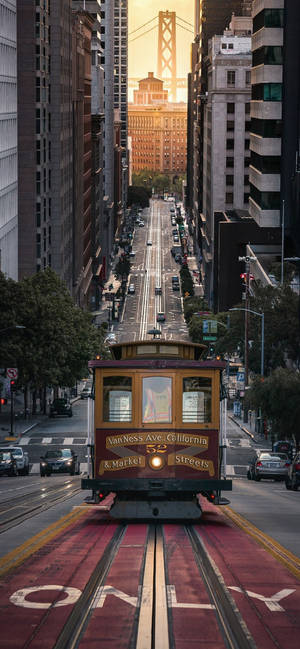 San Francisco telefon kabelbane solnedgang — iPhone 16 Pro Max Bakgrunner