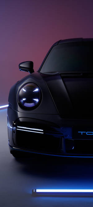 Slank svart Porsche 911 — Pixel 10 Bakgrunner