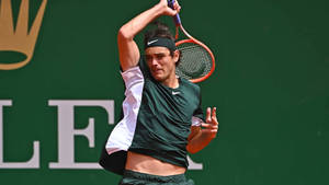 Taylor Fritz i aksjon - kraftig smash — Grønn estetisk GIF Bakgrunner