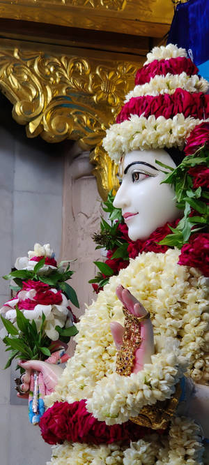 Vakker Krishna Maharaj-statue — Honor Magic V6 Bakgrunner