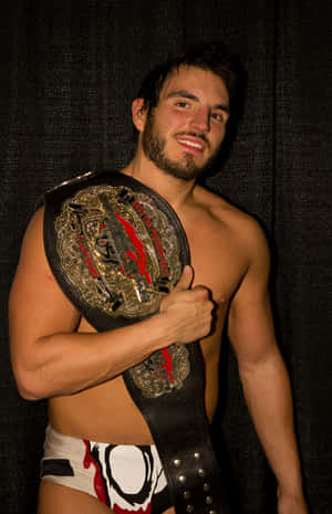 Wrestler Johnny Gargano med tungvektsbelte — Huawei MatePad 11.5 (2026) Bakgrunner